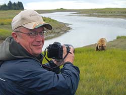 Bill enjoying a close-up of an Alaskan Grizzly Bear