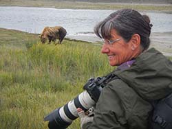 Lin photographs an Alaskan Grizzly Bear up close with her Canon 100-400mm