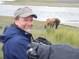 Brian enjoying watching the grizzly bears on Silver Salmon Creek.