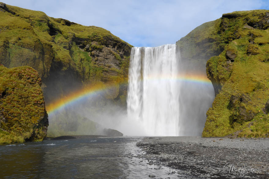 Rainbow At Skogafoss Waterfall In Iceland