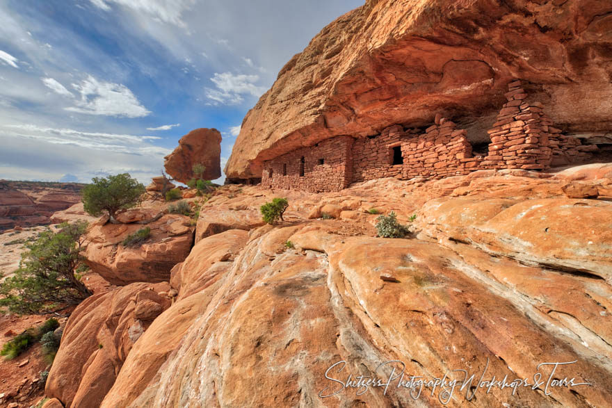 Anasazi Cliff Dwelling with red rock.