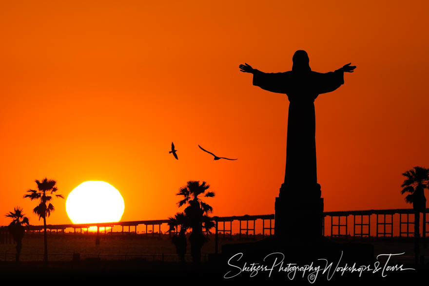 Christ Image with Setting Sun