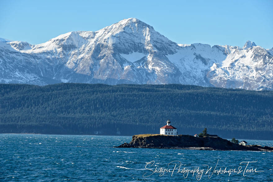 Eldred Rock Lighthouse in front of a mountain