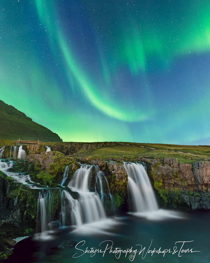 Kirkjufell Waterfall with the Aurora Borealis