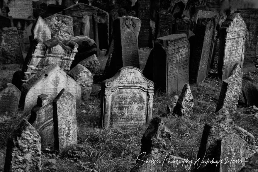 Light shines on headstones at Jewish Cemetery