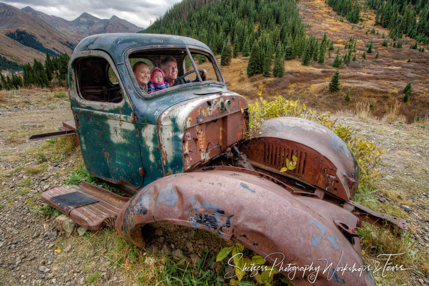 Old Car with Family Portrait
