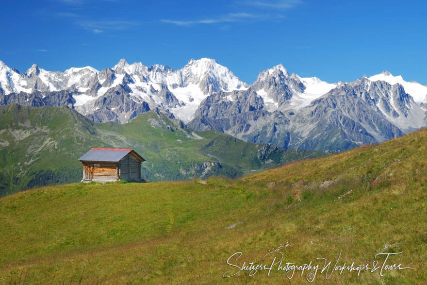 Scenic photo of Walkers Haute Route with hut and mountains