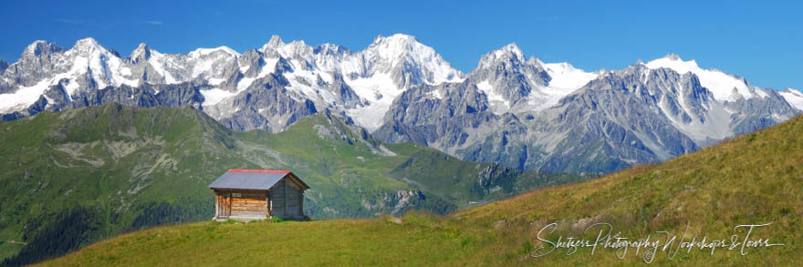 Scenic photo of Walkers Haute Route with hut and mountains