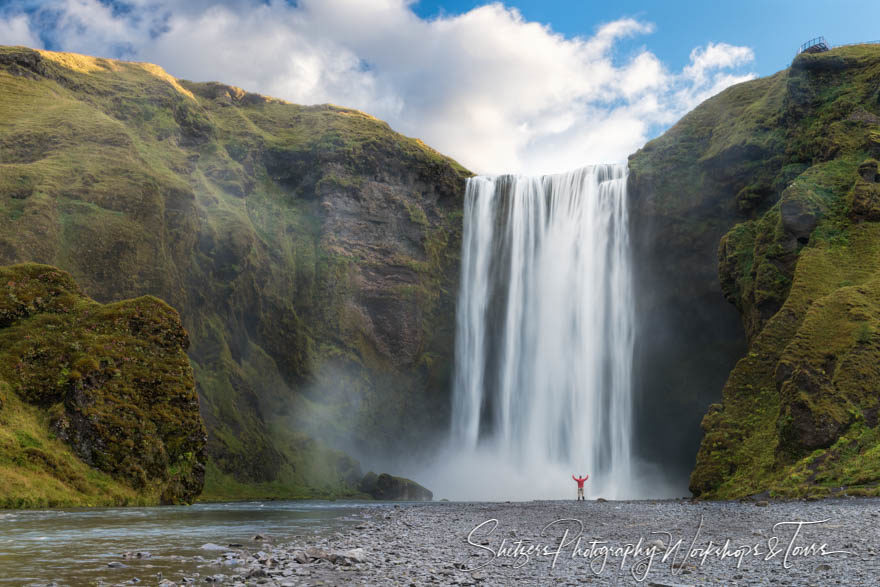 Skógafoss Waterfall with person