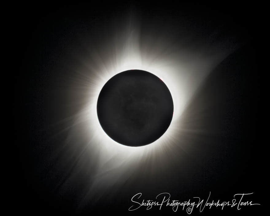 Solar Eclipse with earth glow and corona