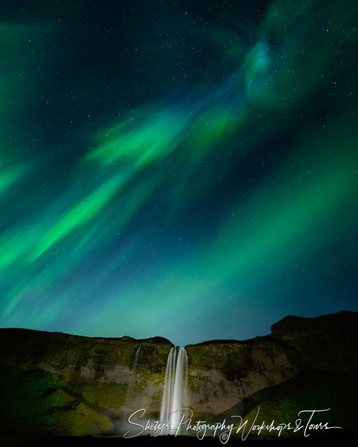 Seljalandsfoss Waterfall with Northern Lights