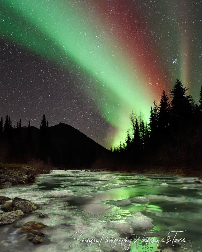 Red and green beams of the aurora