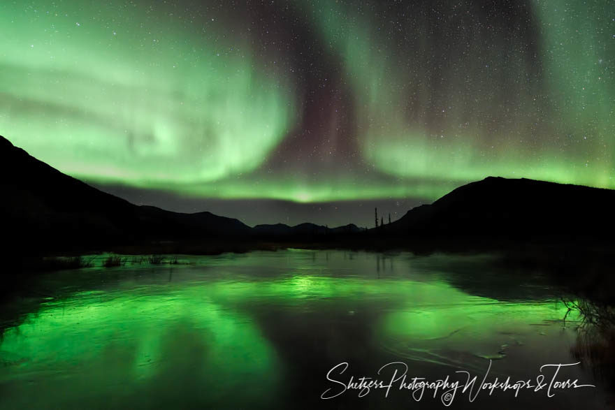 Swirling reflection of the Aurora Borealis